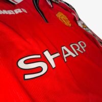 IMG_20260326_155447-Photoroom Manchester United 1998 Beckham #7 - Jersey Fut Retro Manga Larga